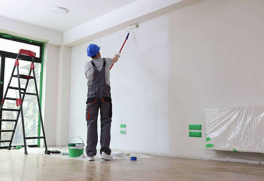 Man painting a wall